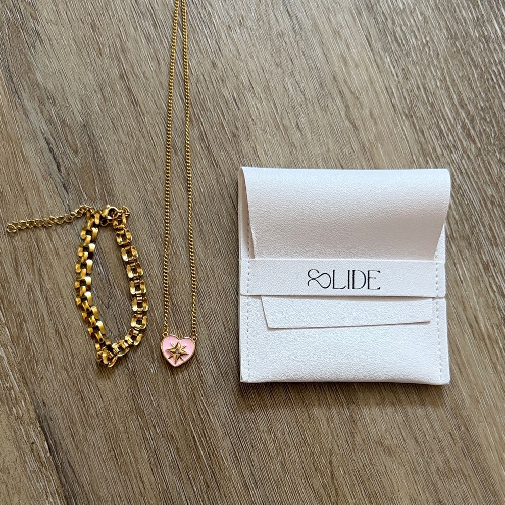 Slide jewelry gold bracelet and heart starburst necklace bundle